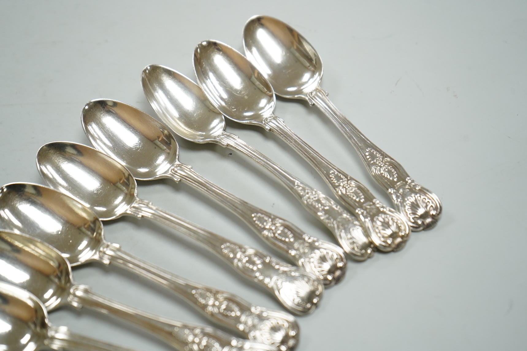 A matched set of ten William IV/Victorian silver Kings pattern teaspoons, including nine by Mary Chawner, London, 1834 and 1837, 11.5oz.